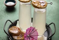 Sparkling Lemonade Mimosa with Brûléed Lemon Garnish