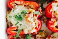 Quinoa-Stuffed Bell Peppers with Savory Tomato Filling