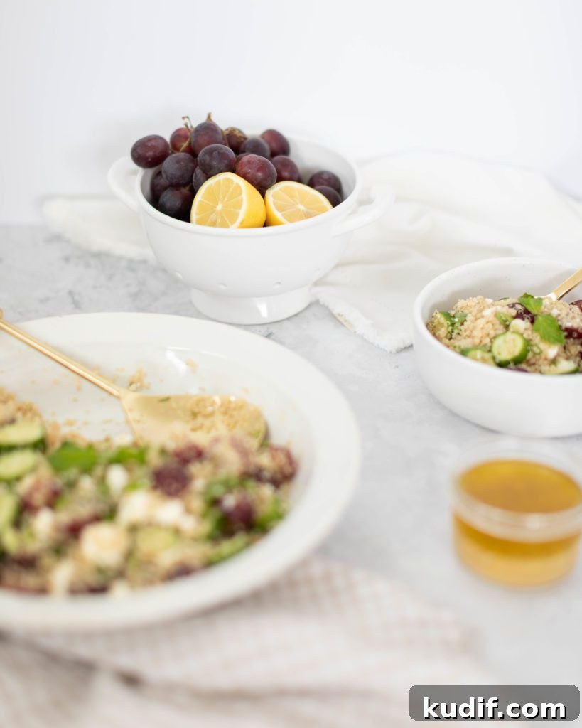 Minted Feta, Grape & Cucumber Quinoa Salad Recipe 4 minted quinoa salad in a bowl with fresh grapes and lemon