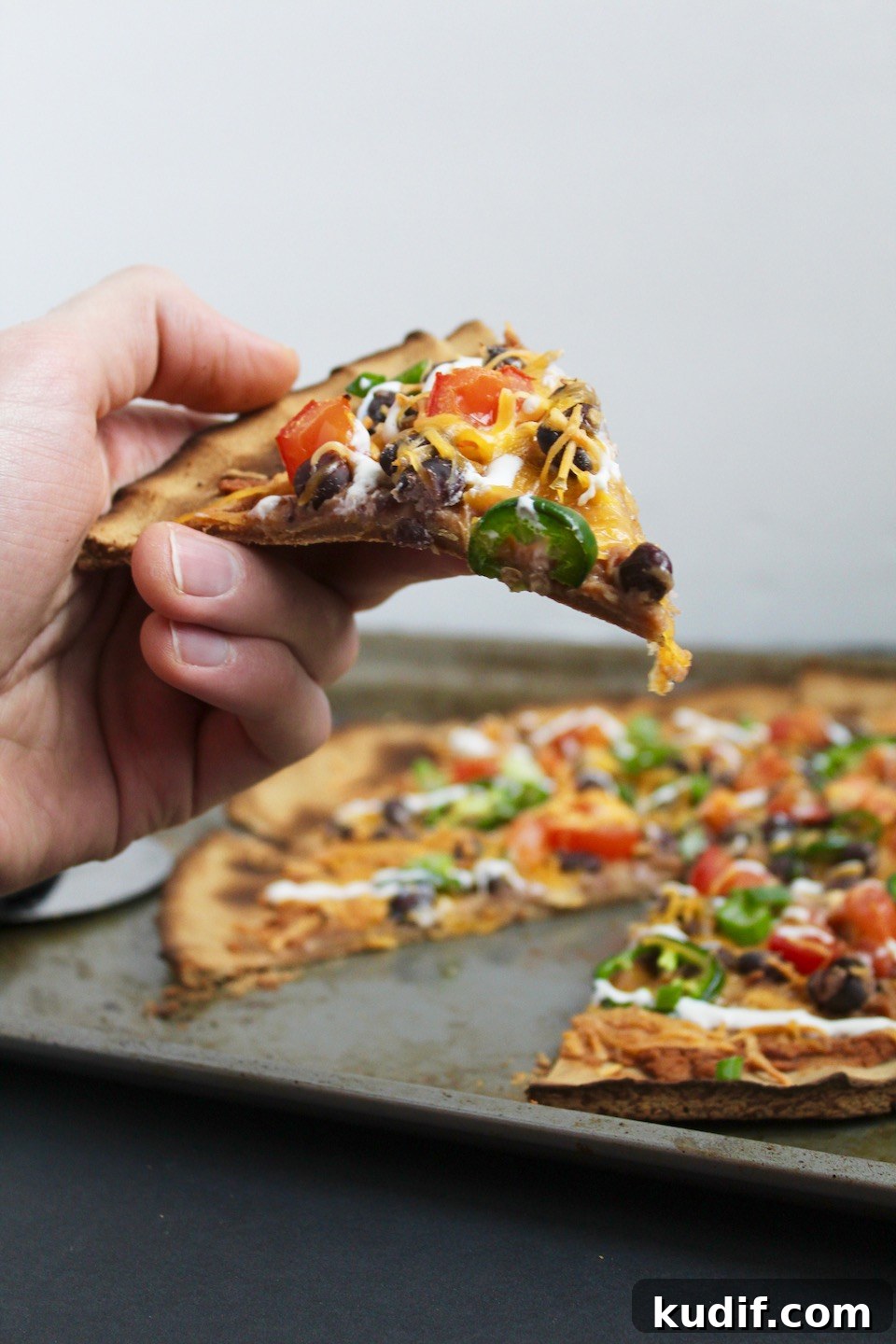 Cauliflower Crust Nacho-Style Pizza: Loaded Mexican Flavor 7 Slices of Cauliflower Crust Nacho Pizza