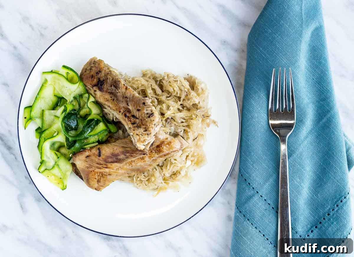 31 Delicious Recipes That Deliver Big Flavor with Little Effort 11 Ribs and Sauerkraut with a fork.