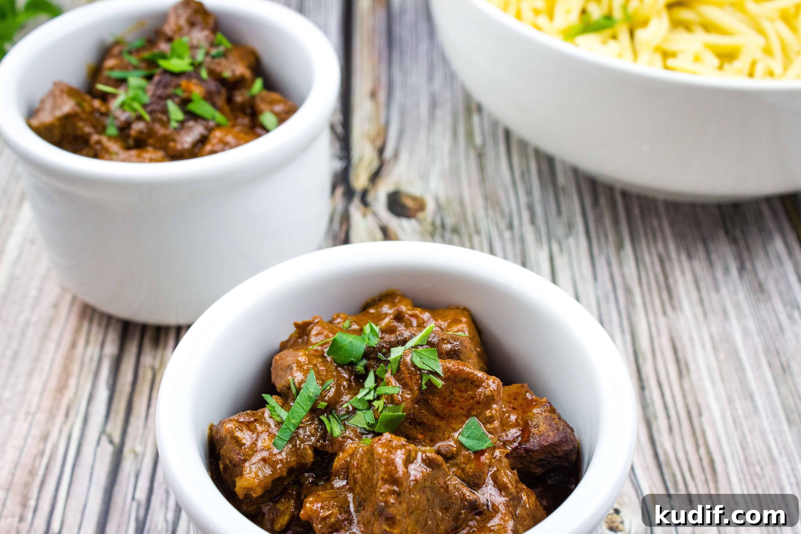 31 Delicious Recipes That Deliver Big Flavor with Little Effort 22 Hungarian Goulash in two white bowls.