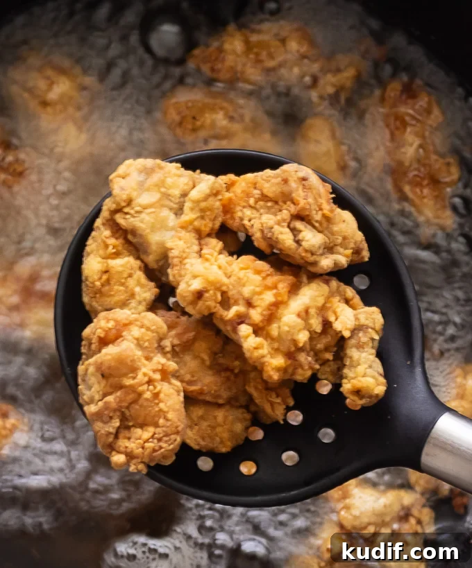 Sweet and Sour Chicken Recipe That Beats Takeout 4 Crispy fried chicken fresh out of the oil