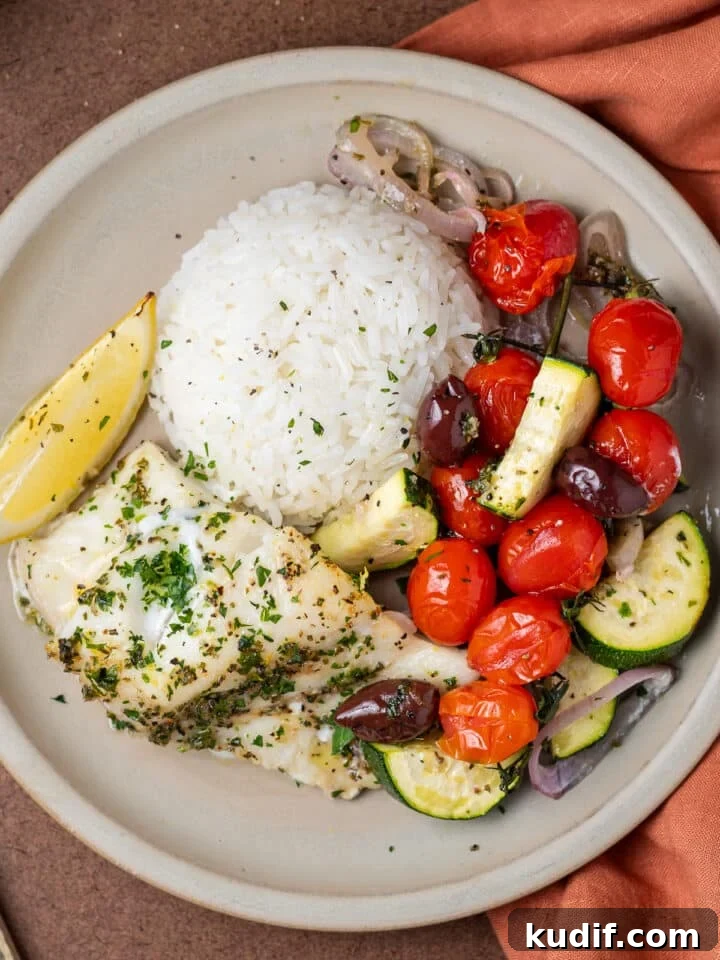 Mediterranean Sheet-Pan Baked Cod with Parsley Garlic Oil 13 mediterranean baked cod, tomatoes, olives, zucchini and a mound of white rice
