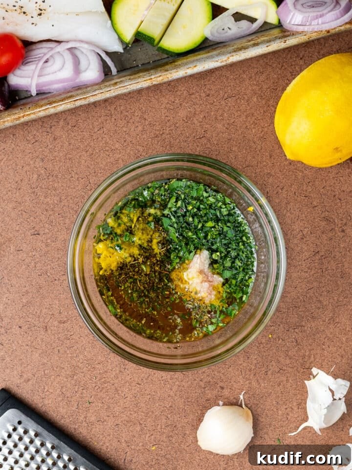 Mediterranean Sheet-Pan Baked Cod with Parsley Garlic Oil 7 parsley, garlic, dried oregano, lemon zest, honey, and olive oil in a small bowl