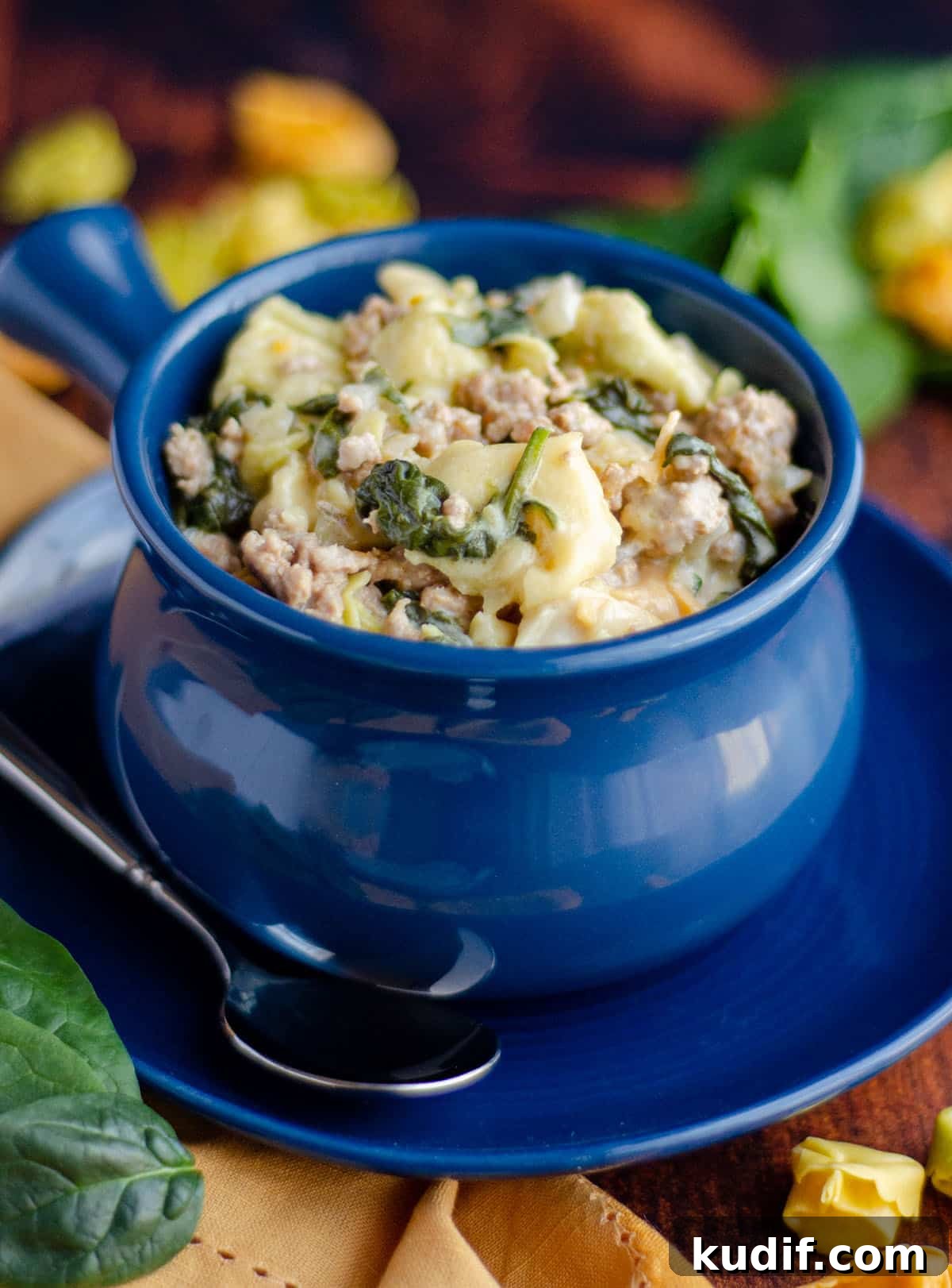 Hearty Italian Sausage Tortellini Soup Recipe 4 sausage tortellini soup in a blue bowl