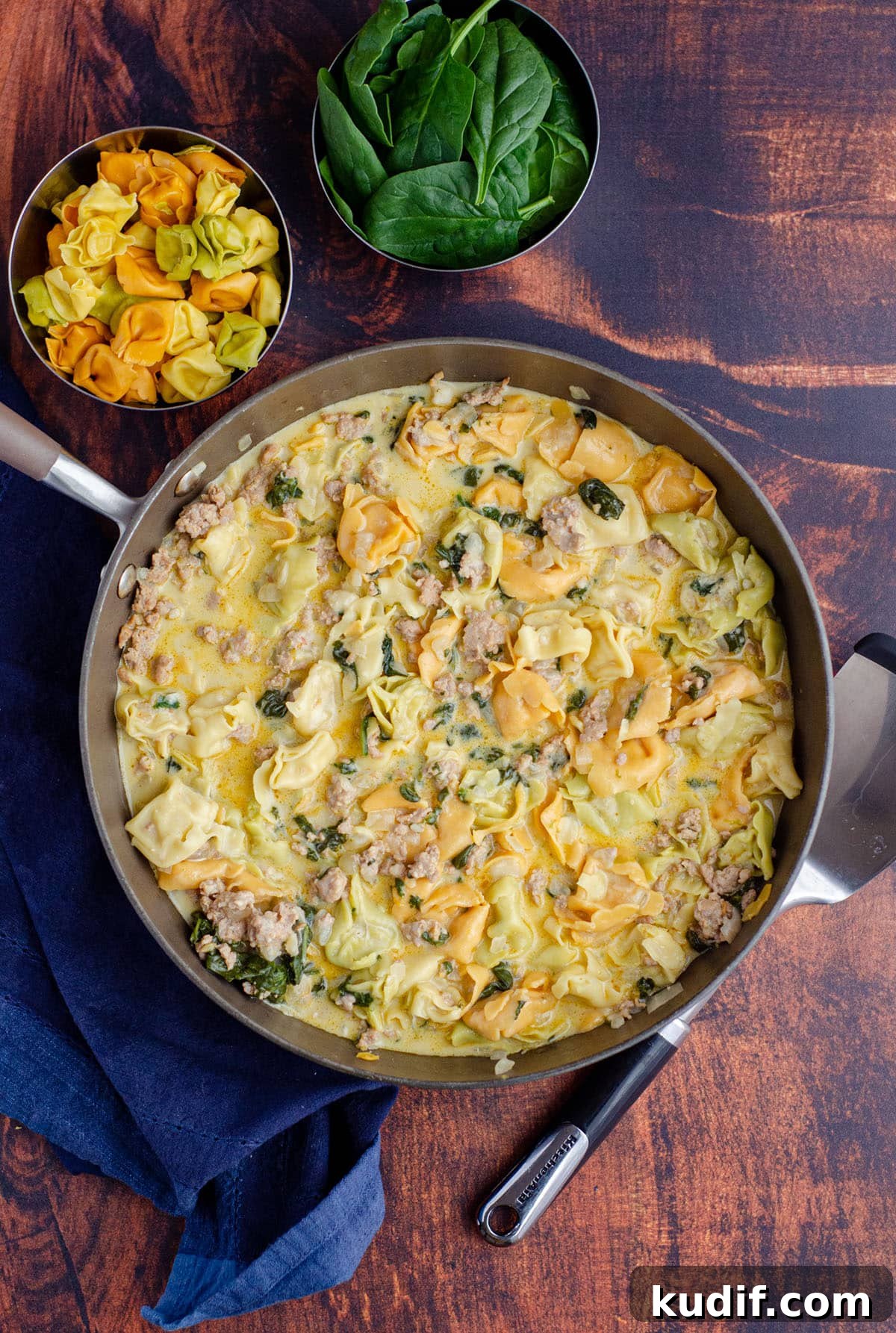 Hearty Italian Sausage Tortellini Soup Recipe 6 aerial photo of sausage tortellini soup in a large skillet