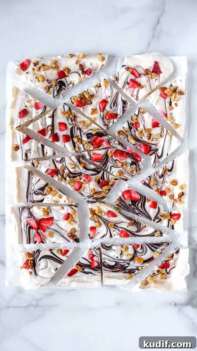 Strawberry Frozen Yogurt Bark Recipe — Quick Summer Dessert 6 keto yogurt bark topped with strawberries chocolate and walnuts