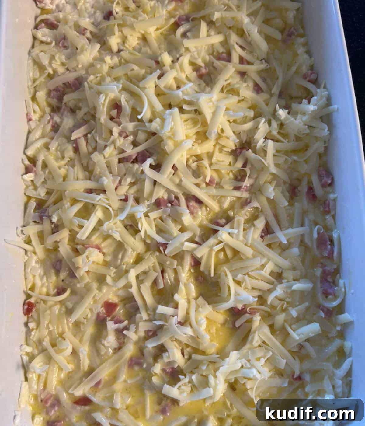 Cheesy Ham, Egg & Hashbrown Breakfast Casserole Recipe 7 Breakfast Casserole with cheese ready to bake.