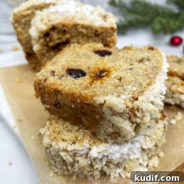 Sliced Christmas banana bread on a serving board.