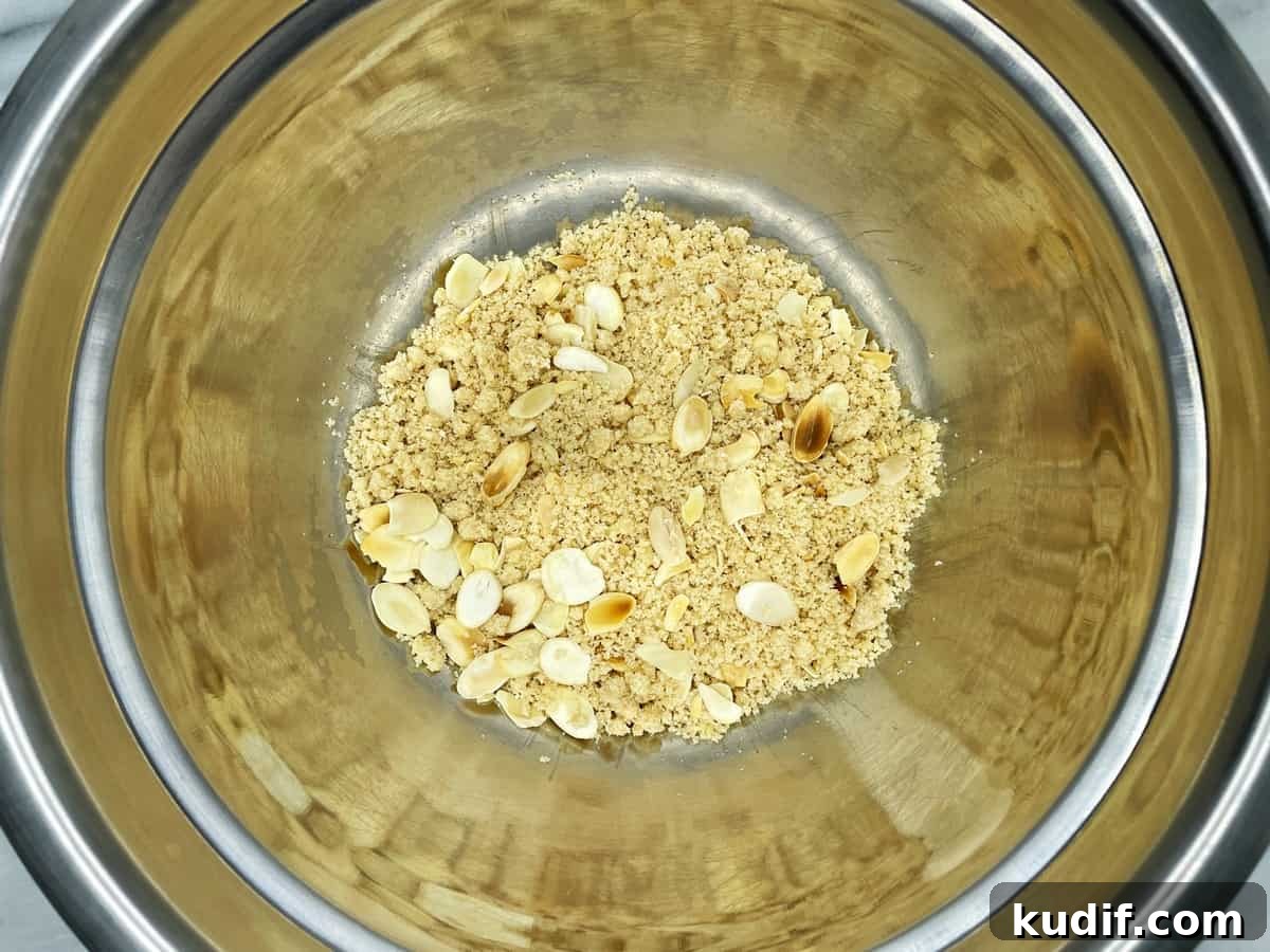 Crumble topping in a metal bowl