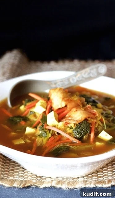 Comforting Asian Vegetable and Tofu Soup Recipe 3 Asian Vegetable Soup in white soup bowl.