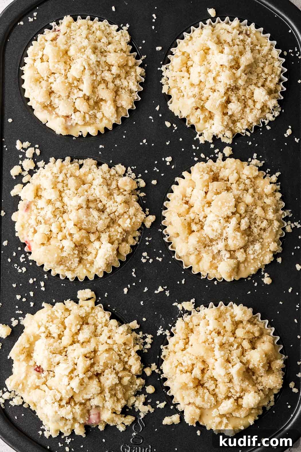 Strawberry Muffins with Crunchy Strawberry Crumble Topping 12 fill muffin tins to the top and top with streusel