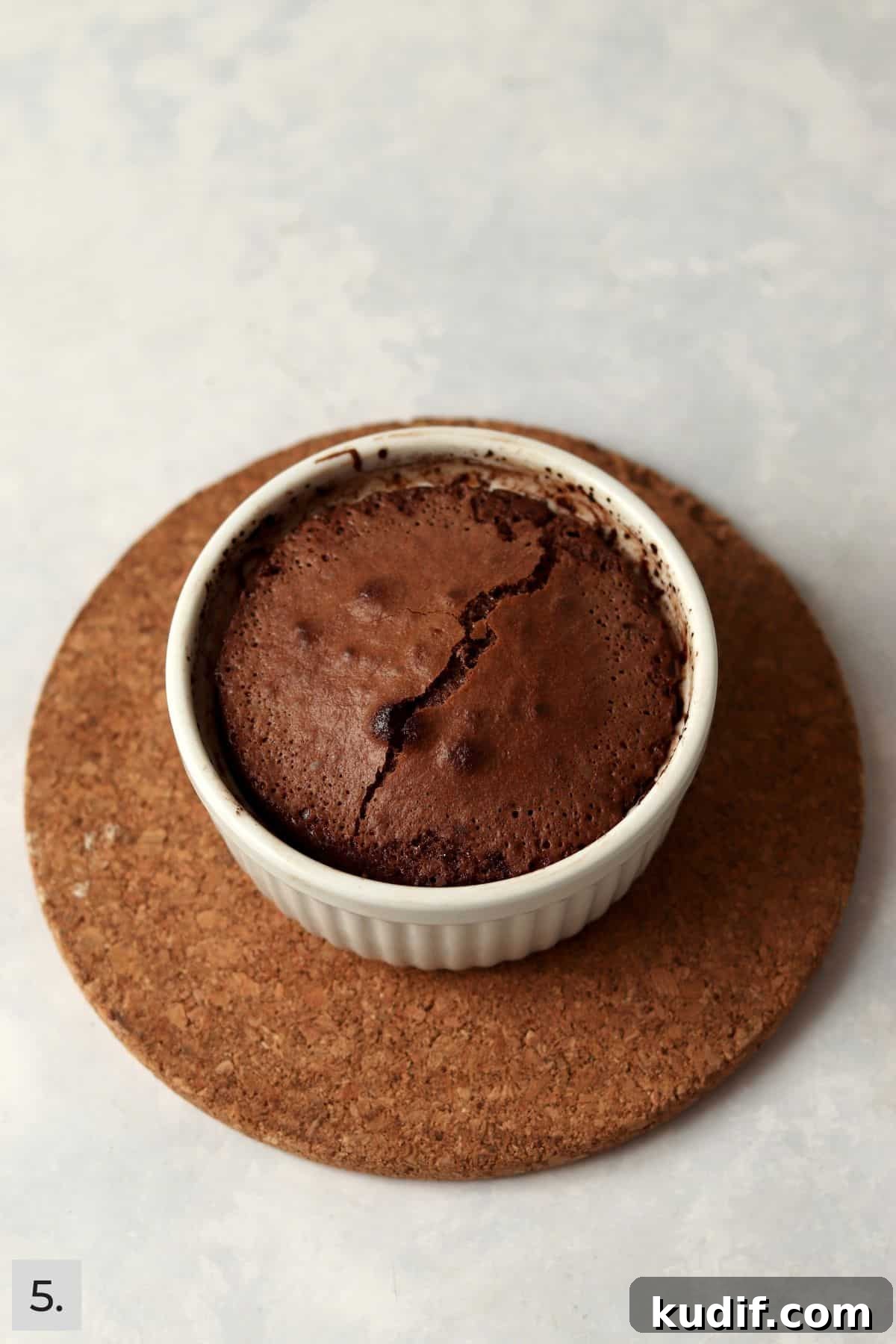 Baked single serve lava cake in a ramekin.