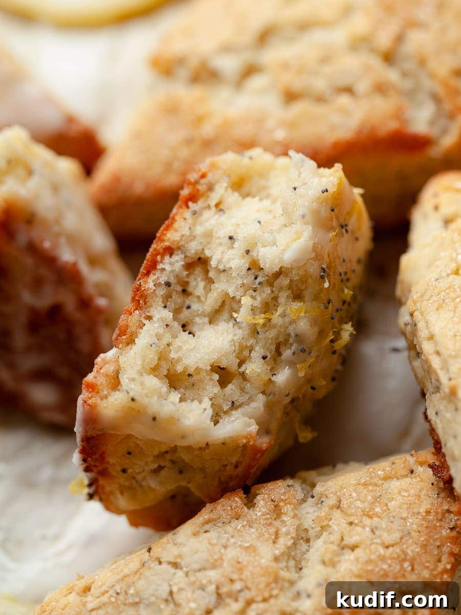 Fluffy Gluten-Free Lemon Scones Recipe for Perfect Tea-Time 8 a broken in half lemon poppyseed scone