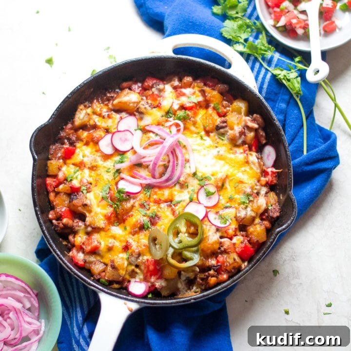 One Skillet Cheesy Enchilada Beef and Potatoes | Sarcastic Cooking