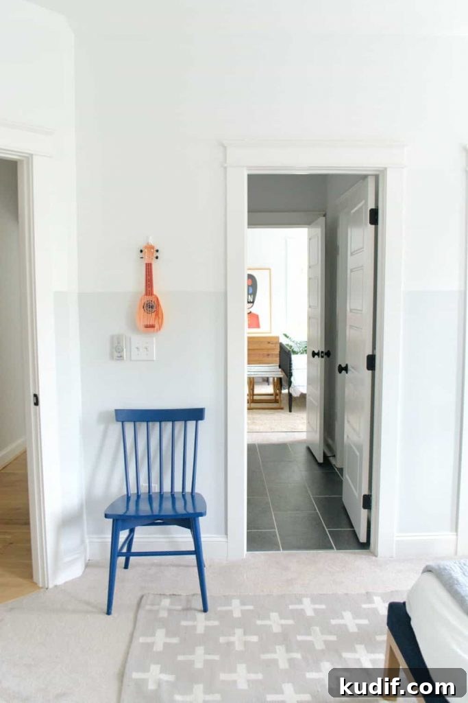 a blue chair in a bedroom