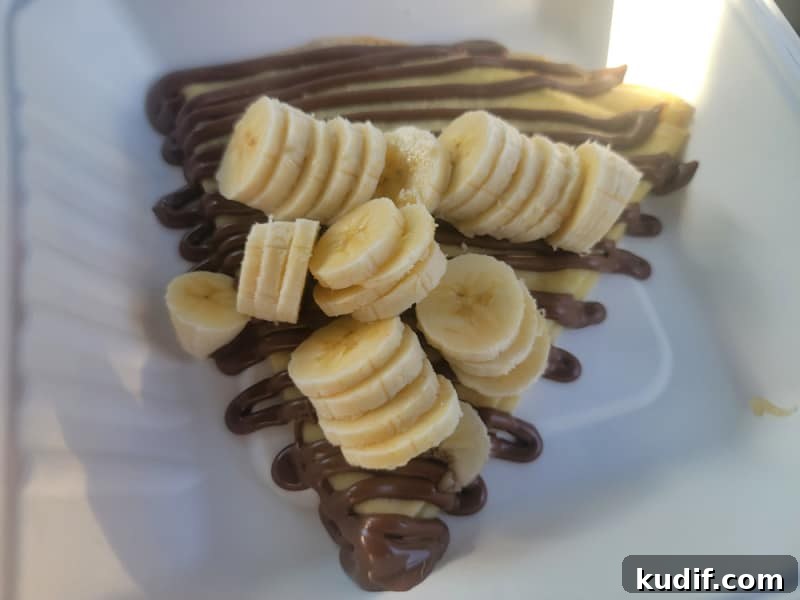 Crepe with nutella and bananas in a box