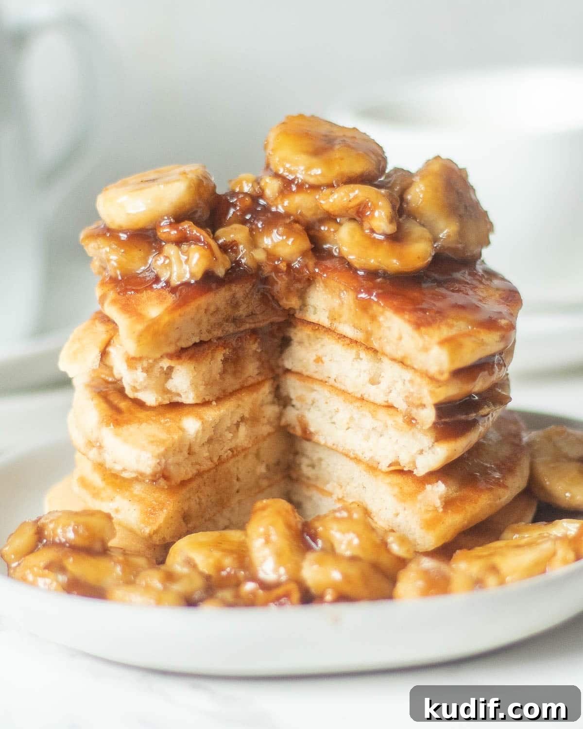 Bananas Foster Pancakes with Rum-Butter Sauce Recipe 3 bananas foster pancakes ihop inspired on a plate