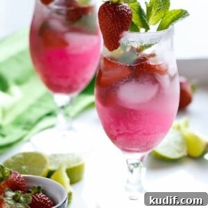 Strawberry Coconut Mojito Recipe – Refreshing Summer Cocktail 11 Strawberry Coconut Mojitos in a glass