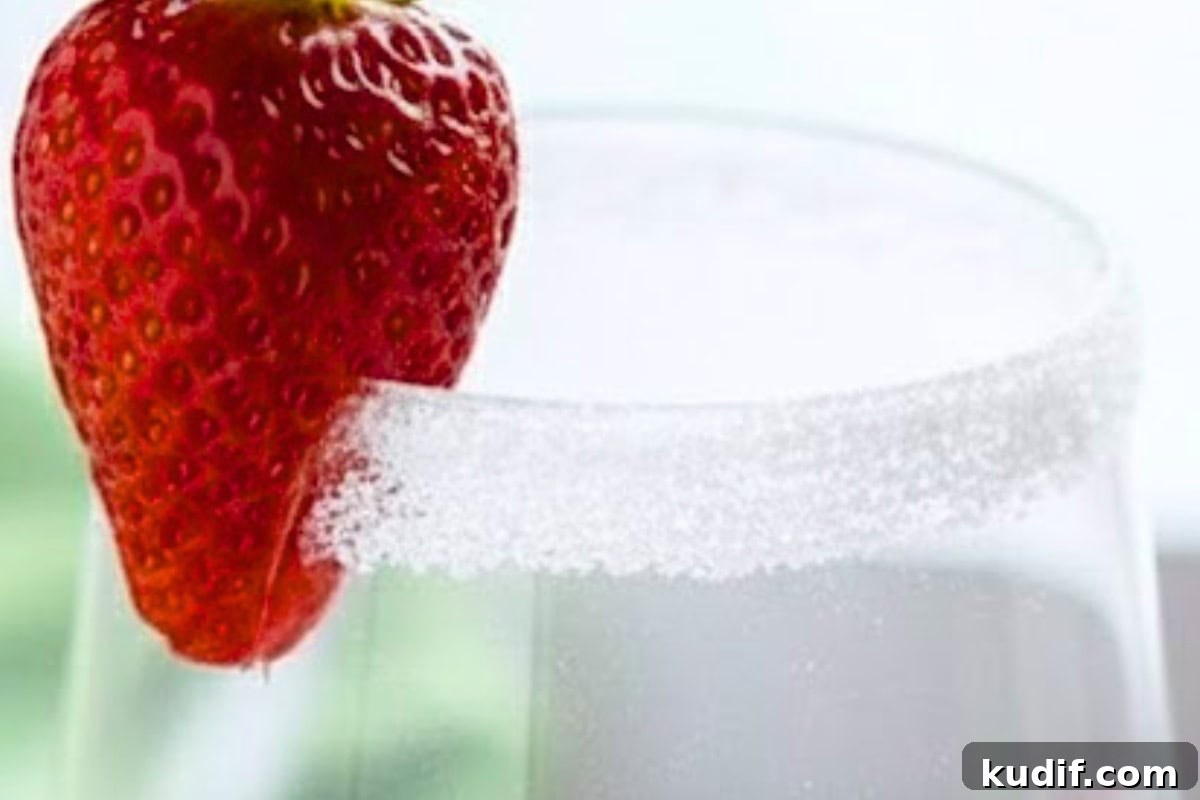 Strawberry Coconut Mojito Recipe – Refreshing Summer Cocktail 6 Run halved strawberries around the rims of the glasses and dip into sugar