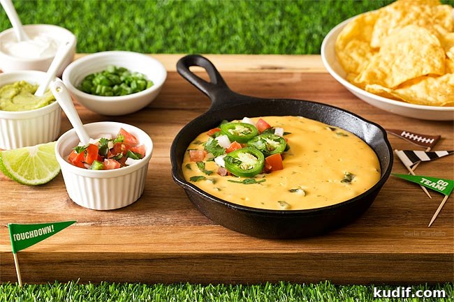 Homemade Queso: Creamy Nacho Cheese Dip Recipe 3 Nacho Cheese Dip on brown cutting board
