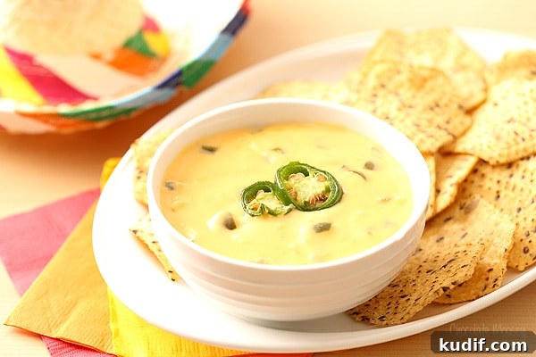 Homemade Queso: Creamy Nacho Cheese Dip Recipe 6 Queso in White Bowl