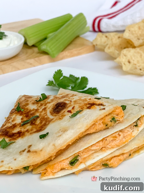 Spicy Buffalo Chicken Quesadillas Recipe for Game Day Snacks 9 Best easy Buffalo Chicken Quesadilla recipe, buffalo chicken dip recipe, easy 15 minute meal recipe, weeknight dinner recipe, easy lunch dinner recipe, best chicken easy recipe, easy tortilla chicken recipe