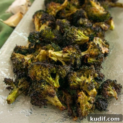 Crispy Garlic-Roasted Broccoli Recipe for Flavorful Sides 6 garlic roasted broccoli on a platter