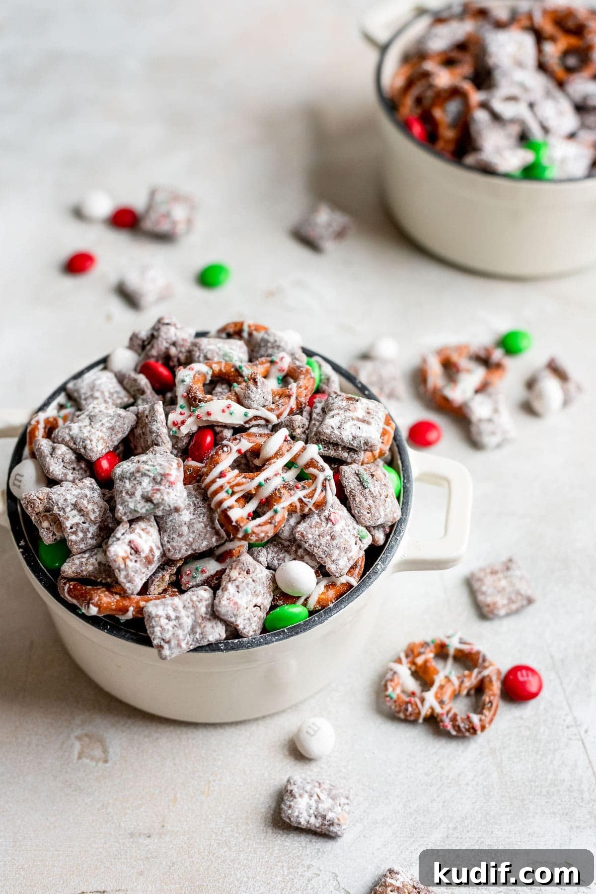 Festive Christmas Puppy Chow Snack Mix Recipe 8 finished puppy chow in container
