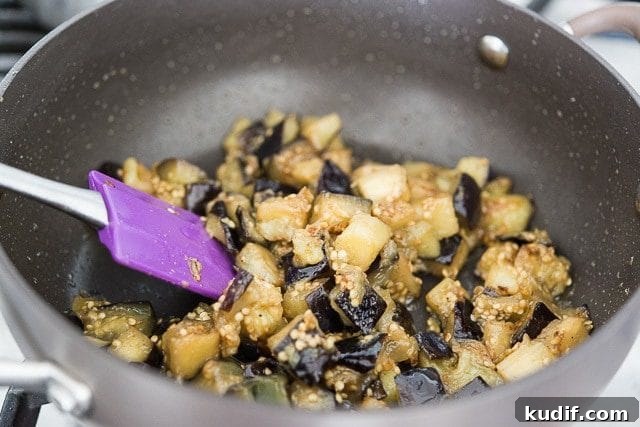 Cooked Eggplant Cubes in a Pan