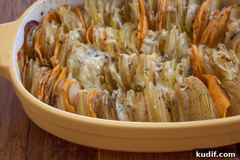 Hasselback Potato Gratin Recipe: Crispy Layers & Creamy Center 6 Hasselback Potato Gratin. Slices of Yukon gold potatoes and yams, topped with a delicious and light cheesy cream sauce.