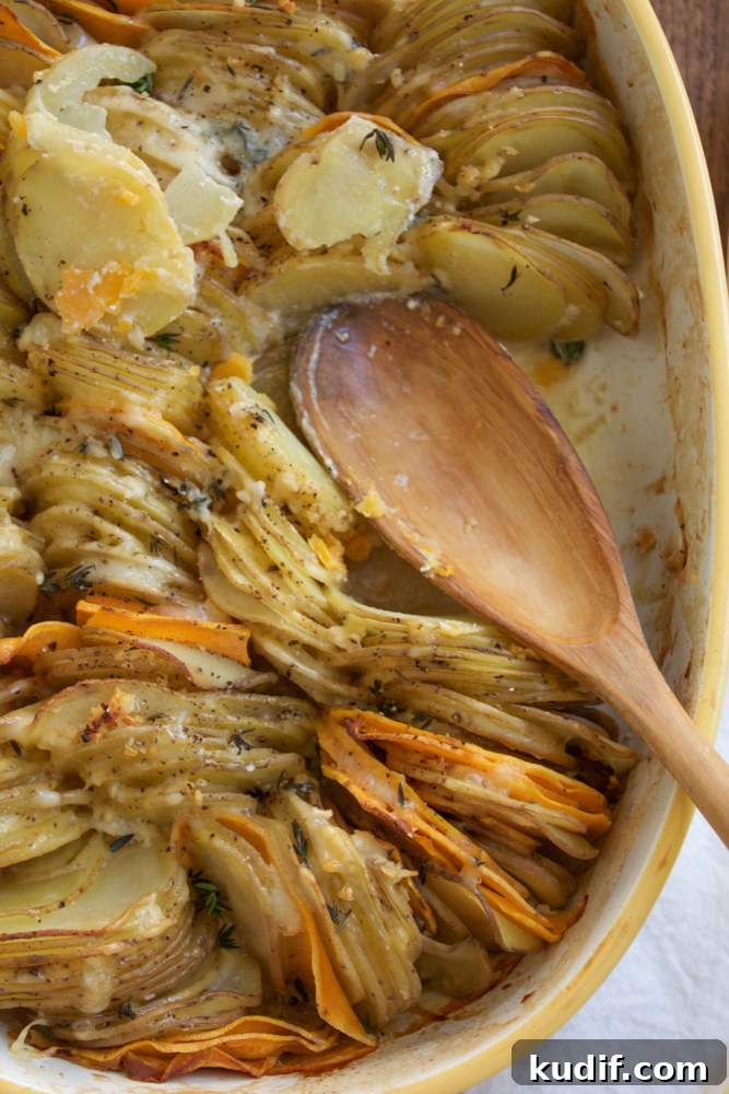 Hasselback Potato Gratin Recipe: Crispy Layers & Creamy Center 7 Hasselback Potato Gratin. Slices of Yukon gold potatoes and yams, topped with a delicious and light cheesy cream sauce.