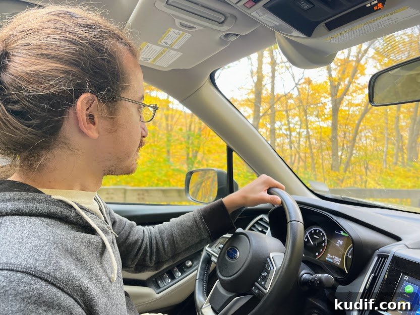 Dylan driving through Smuggler's Notch for Leaf Peeping