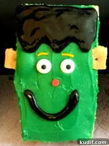 smiling frankenstein face on a rice kripie treat