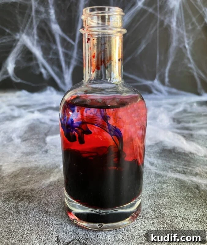 Black Martini Cocktail Recipe and Serving Guide 5 vodka with food coloring added
