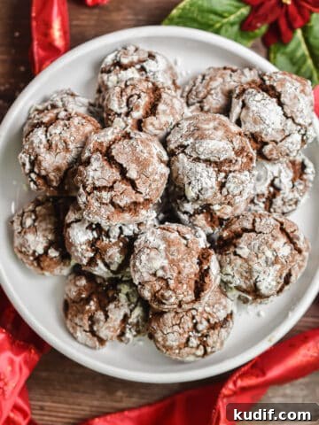 A cookie plate is surrounded by red ribbon.