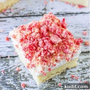 Strawberry shortcake bar cut into a square.