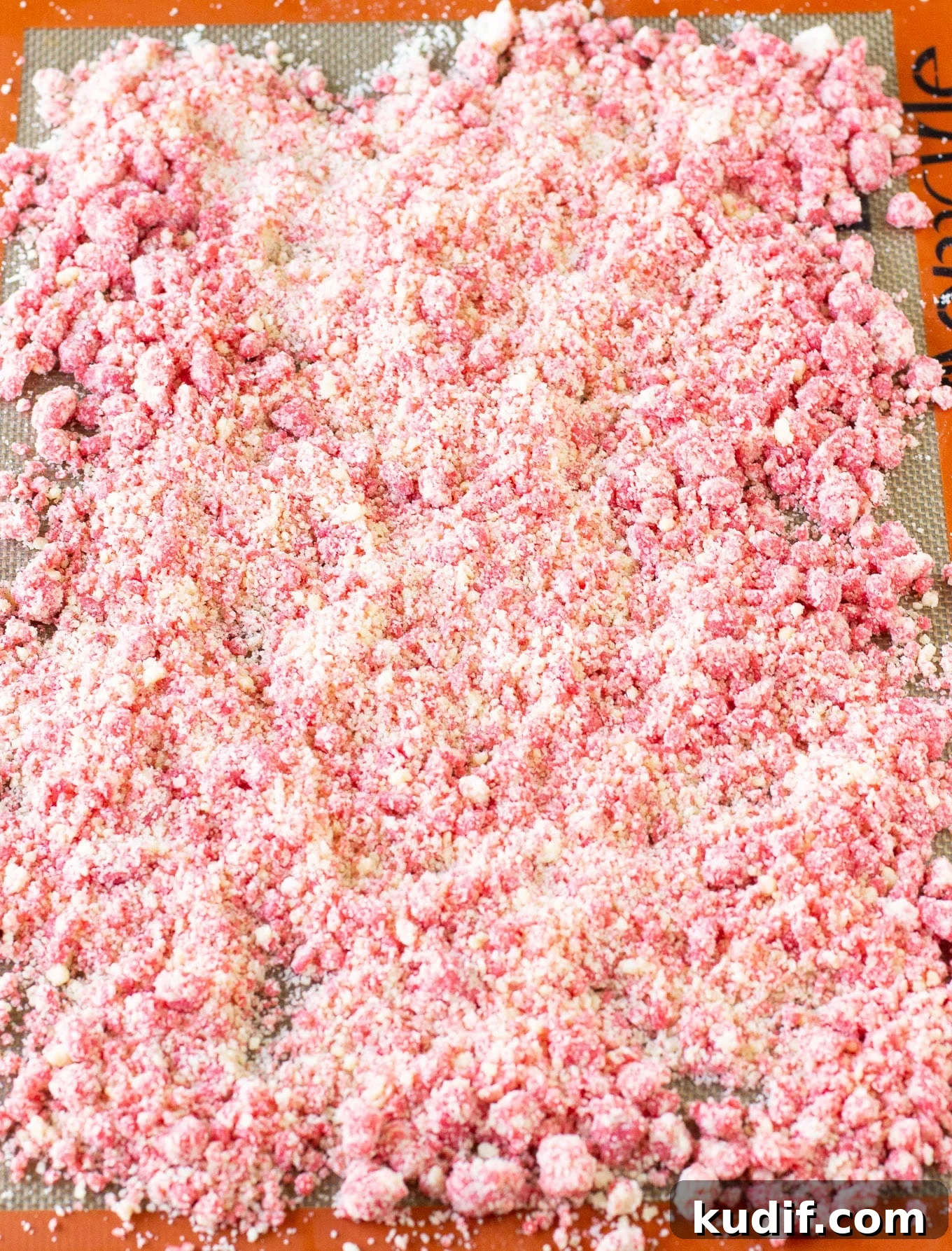 Sheet pan with baked crumble on it. 