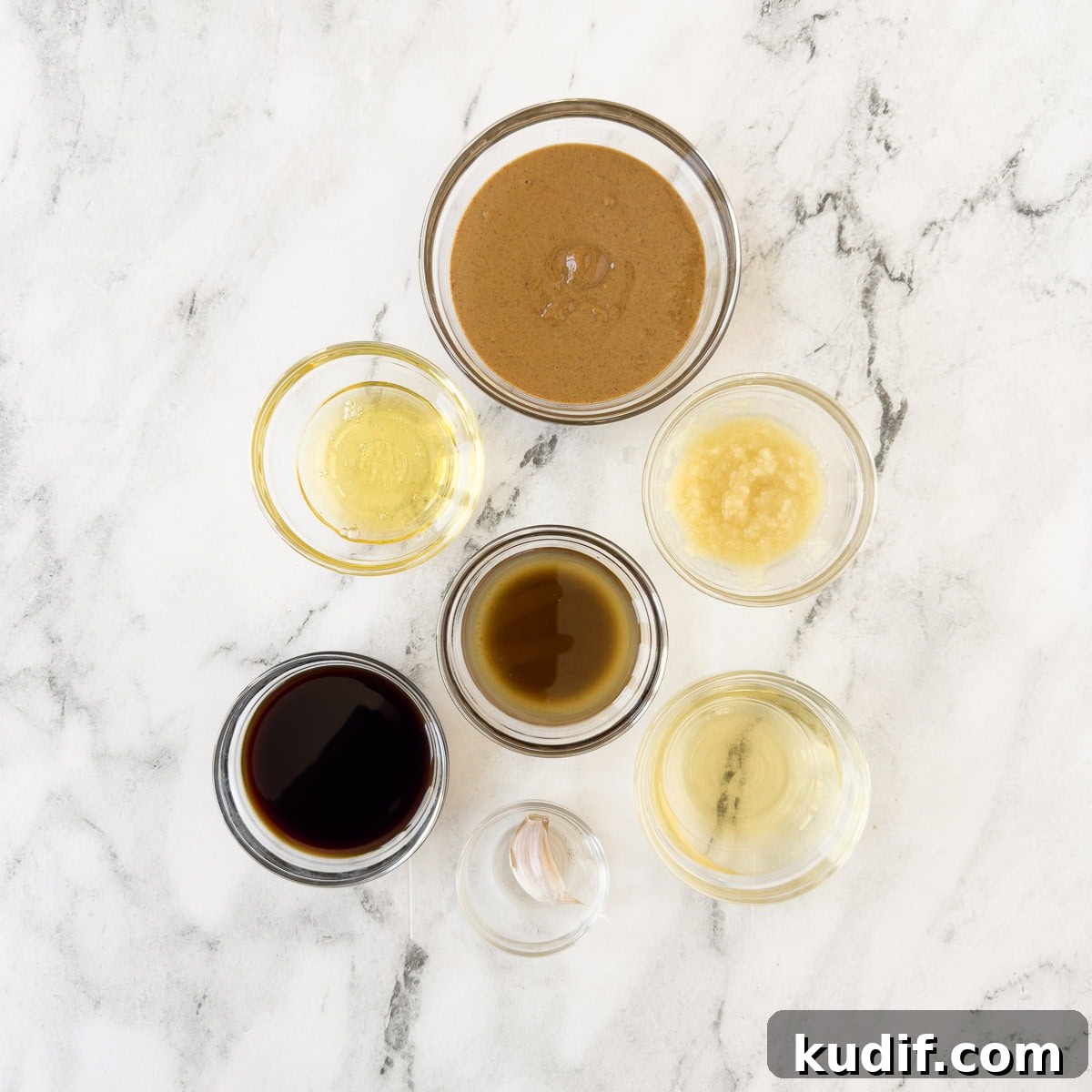 Asian Almond Butter Dipping Sauce (No-Cook) 3 Ingredients for creamy asian dipping sauce with almond butter, ginger, garlic, soy sauce, oil, and honey.