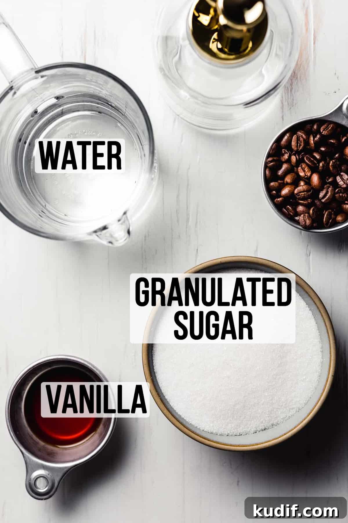 Ingredients needed to make Starbucks vanilla syrup measured out in bowls.