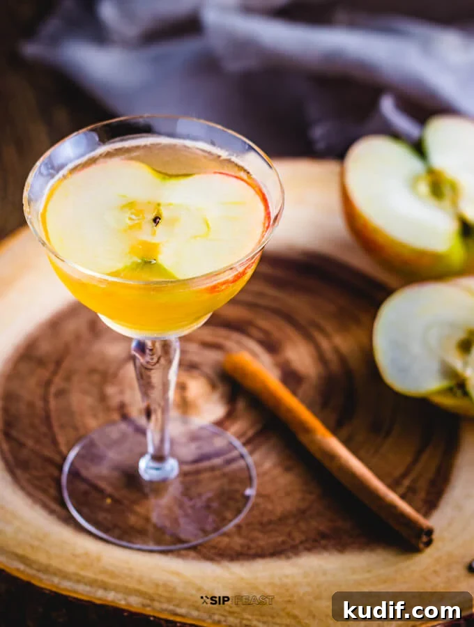 Apple Cider Cocktail - sipandfeast.com #cocktails #bourbon #drinkrecipes Apple cider cocktail with maple syrup and bourbon featured image.