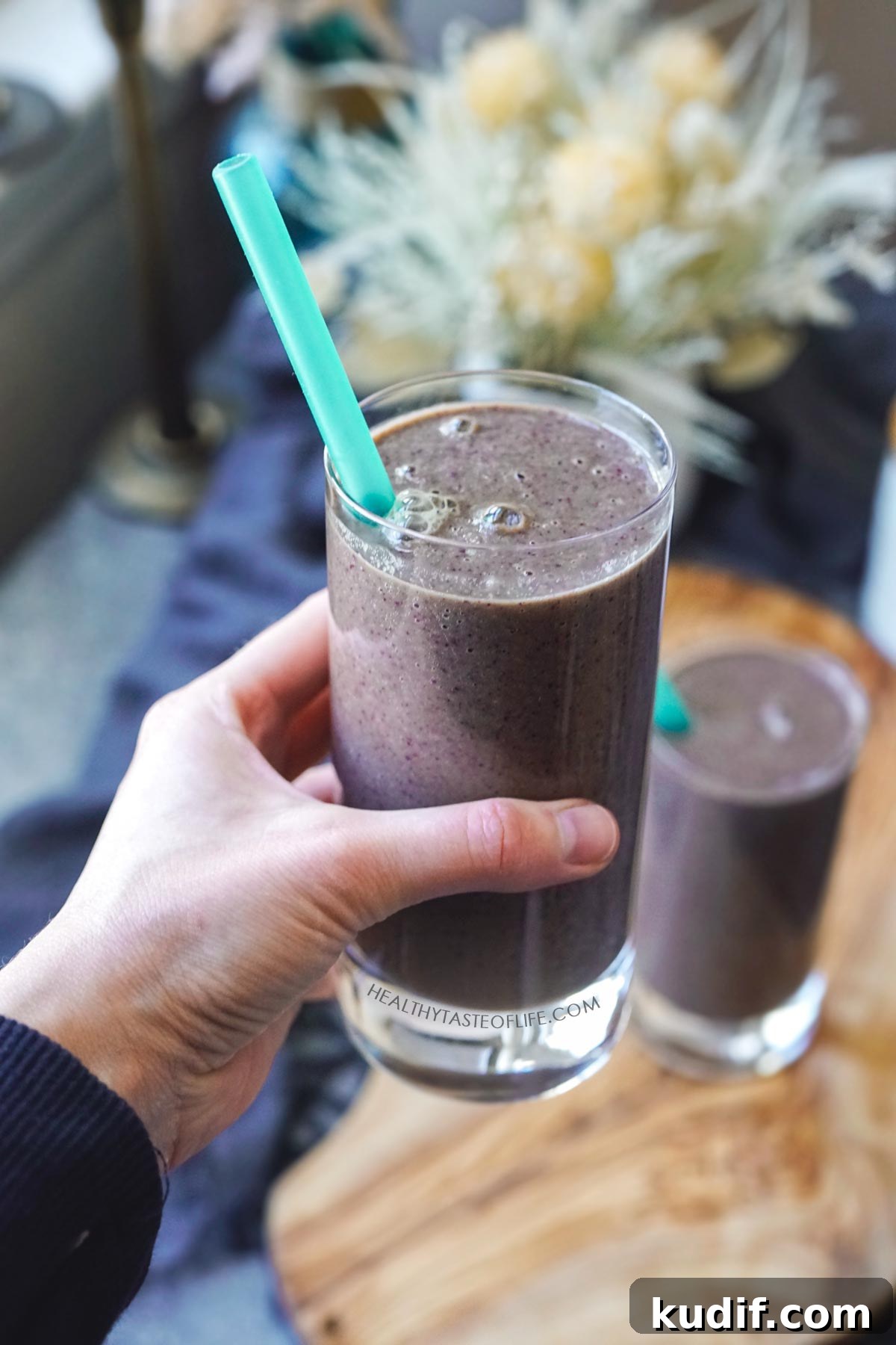 Liver & Gallbladder Detox Smoothie Recipe for Support 4 Green and purple detox smoothie for gallbladder and liver support in a glass with a straw.