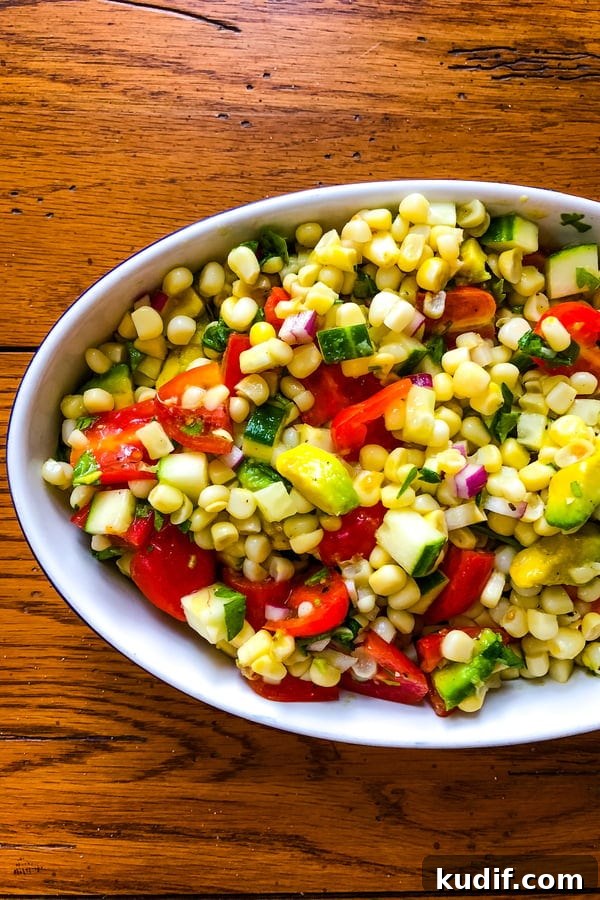 Summer Avocado, Corn, Cucumber & Tomato Salad Recipe 6 a side dish of summer produce with tomatoes and cucumbers