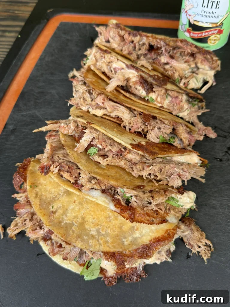Cajun Pulled Pork Tacos with Tangy Slaw and Lime 2 cajun pulled pork tacos