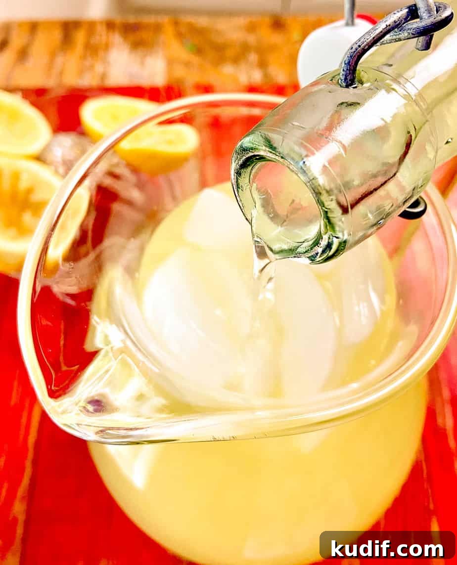 Water being poured into pitcher.
