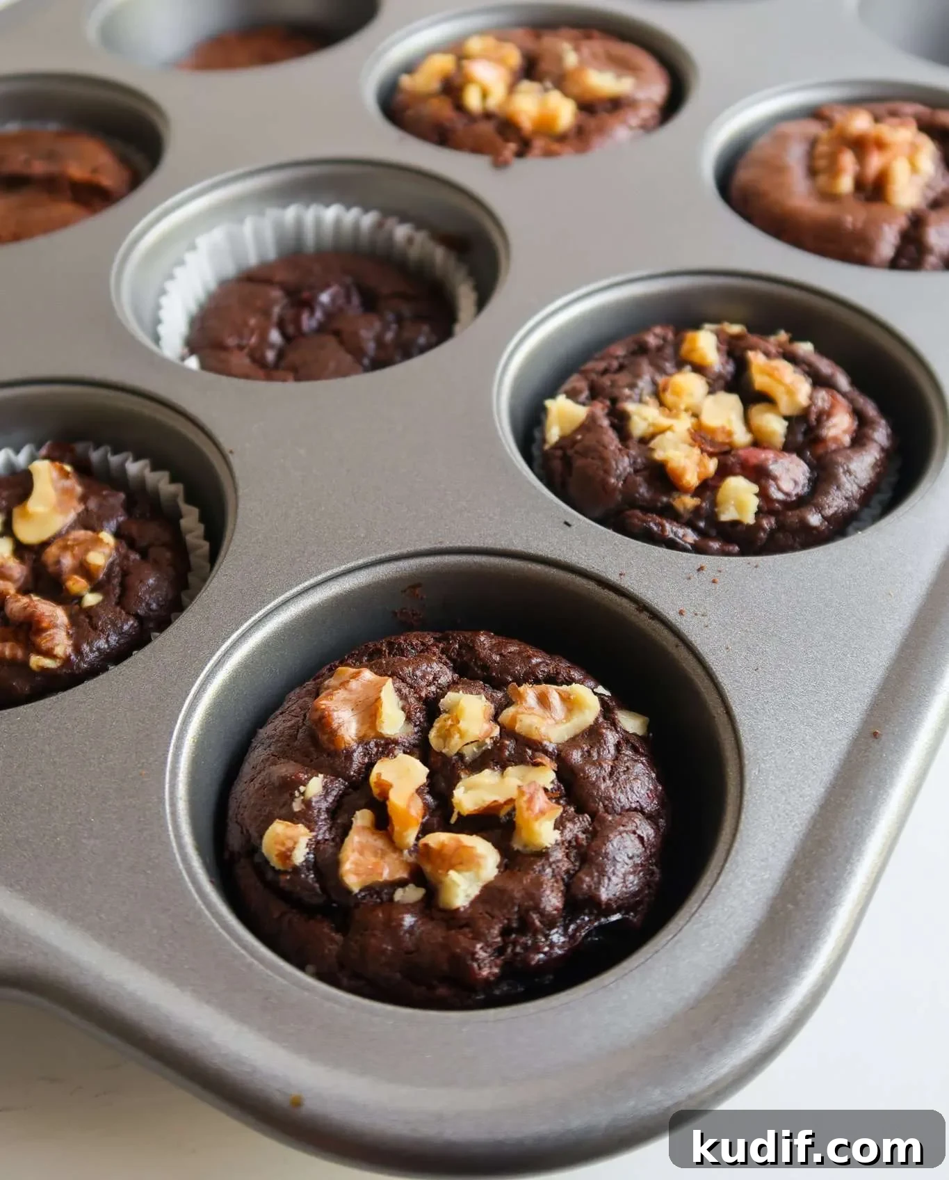 Oatmeal Chocolate Muffins with Gooey Chocolate Chips 3 Healthy and easy oatmeal chocolate muffins recipe! These flourless vegan oat brownie muffins are fudgy, chocolatey and the perfect healthier dessert idea!