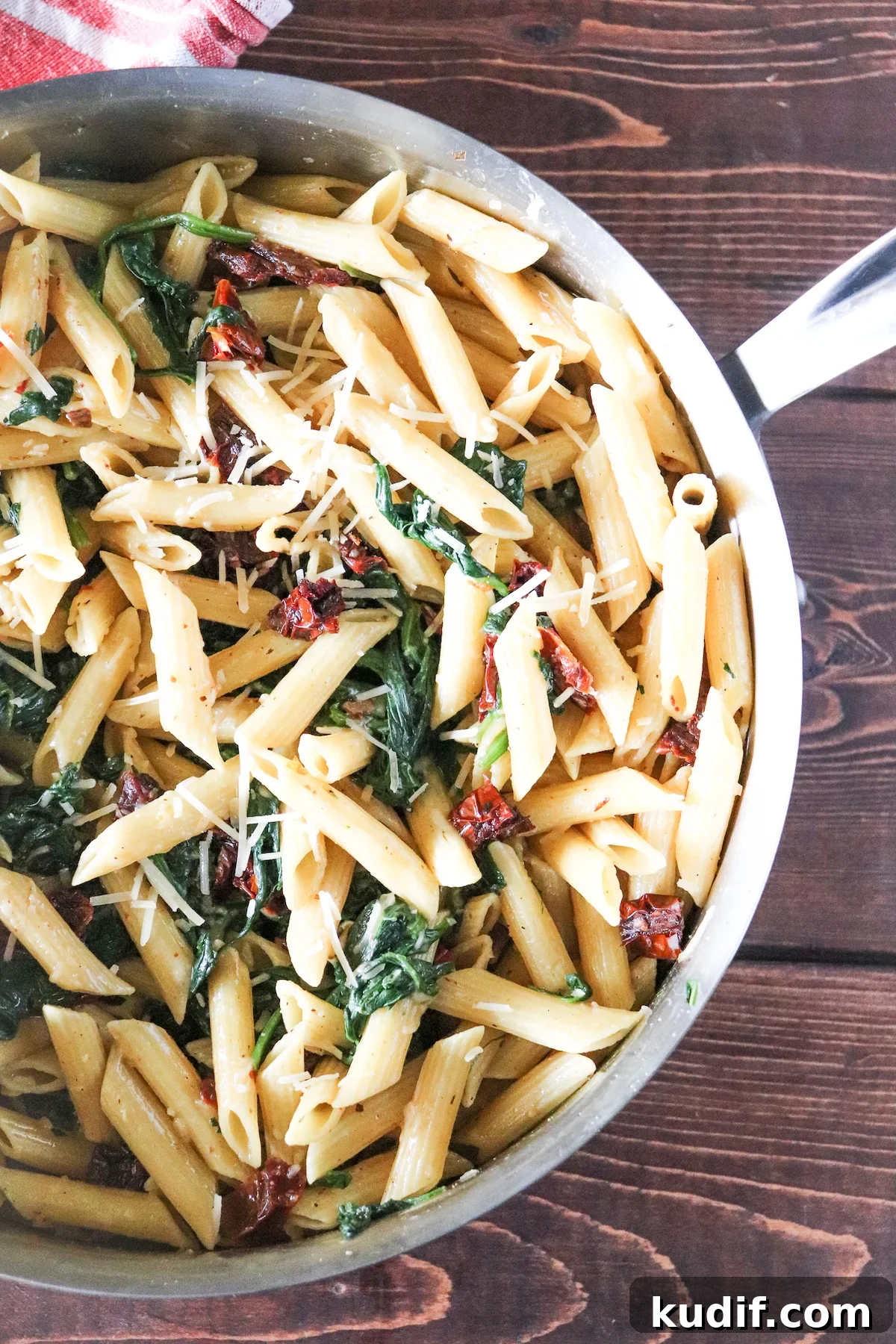Protein Pasta with Sautéed Spinach and Sun-Dried Tomatoes 4 cooked protein pasta in skillet