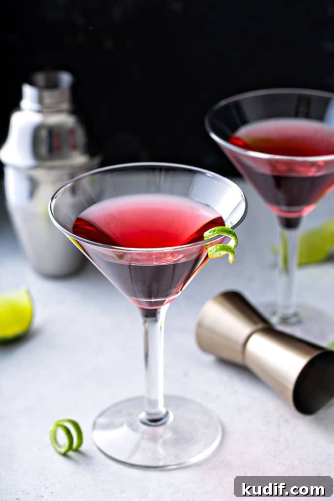Classic Cosmopolitan Cocktail Recipe: How to Mix the Perfect Cosmo 5 Cosmopolitan martini on a white surface