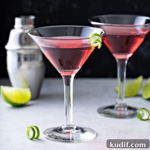 Classic Cosmopolitan Cocktail Recipe: How to Mix the Perfect Cosmo 6 Two Cosmopolitan Martinis on a white surface